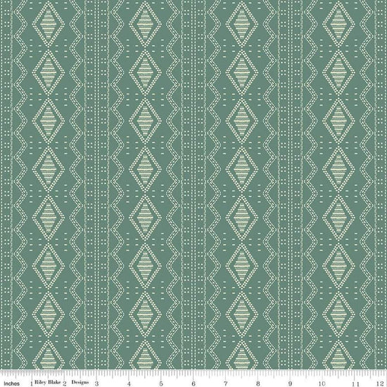Image of the Winged Medley Textile Teal quilting cotton fabric. Features tiles on a green background. Cute Little Fabric Shop