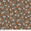 Image of the Winged Medley Petals Brown quilting cotton fabric. Features petals on a brown background. Cute Little Fabric Shop