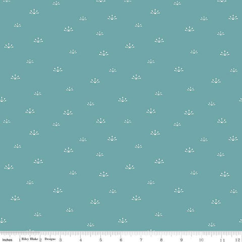 Image of the Winged Medley Woodblock Teal quilting cotton fabric. Features suns on a teal background. Cute Little Fabric Shop