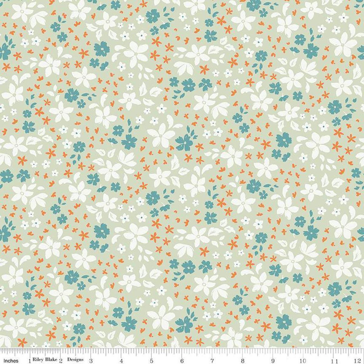 Image of the Winged Medley Petals Sage quilting cotton fabric. Features petals on a green background. Cute Little Fabric Shop