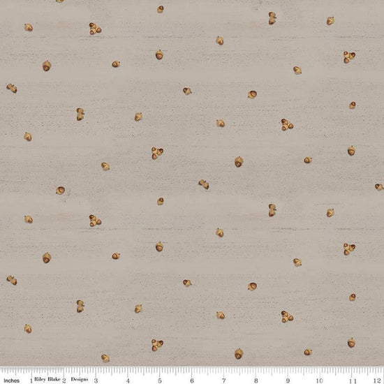 Image of the Covered Bridges in Fall Acorn Ditsy Tan quilting cotton fabric by Riley Blake Designs. Features lines on a brown background. Cute Little Fabric Shop