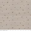 Image of the Covered Bridges in Fall Acorn Ditsy Tan quilting cotton fabric by Riley Blake Designs. Features lines on a brown background. Cute Little Fabric Shop