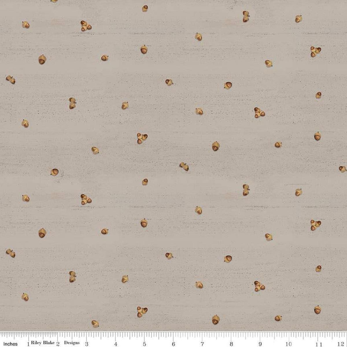 Image of the Covered Bridges in Fall Acorn Ditsy Tan quilting cotton fabric by Riley Blake Designs. Features lines on a brown background. Cute Little Fabric Shop