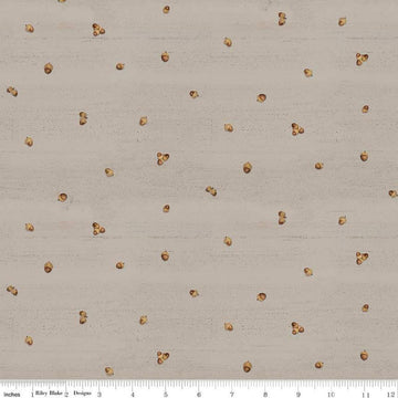 Image of the Covered Bridges in Fall Acorn Ditsy Tan quilting cotton fabric by Riley Blake Designs. Features lines on a brown background. Cute Little Fabric Shop