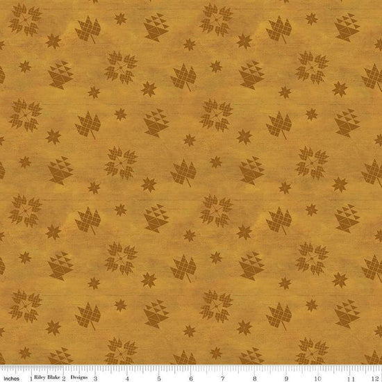 Image of the Covered Bridges in Fall Block Toss Gold quilting cotton fabric by Riley Blake Designs. Features blocks on a gold background. Cute Little Fabric Shop