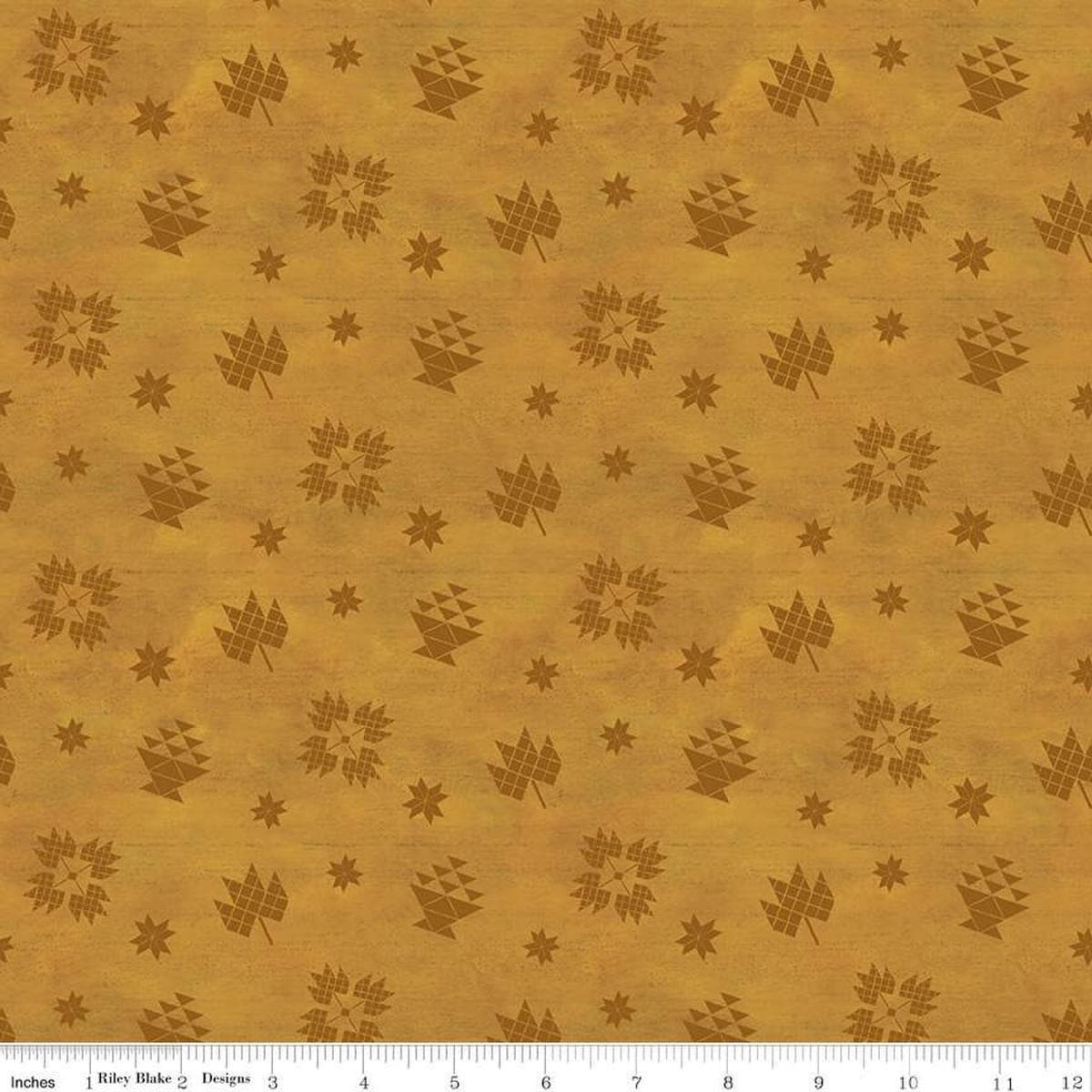 Image of the Covered Bridges in Fall Block Toss Gold quilting cotton fabric by Riley Blake Designs. Features blocks on a gold background. Cute Little Fabric Shop