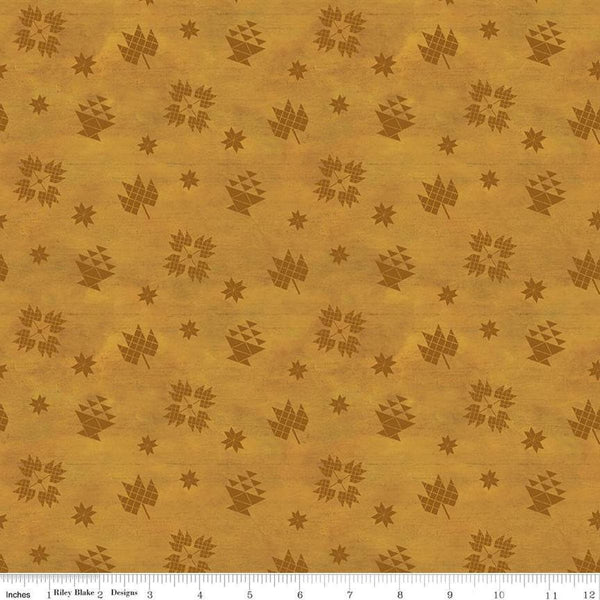 Image of the Covered Bridges in Fall Block Toss Gold quilting cotton fabric by Riley Blake Designs. Features blocks on a gold background. Cute Little Fabric Shop