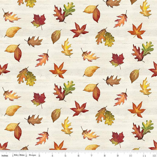 Image of the Covered Bridges in Fall Leaf Toss Cream quilting cotton fabric by Riley Blake Designs. Features leaves on a cream background. Cute Little Fabric Shop