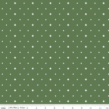 Image of the Charming Christmas Stars Green quilting cotton fabric by Riley Blake Designs. Features stars on a green background. Cute Little Fabric Shop