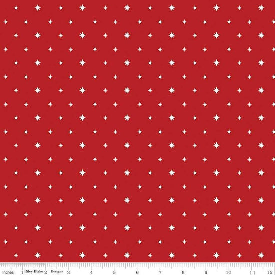 Image of the Charming Christmas Stars Red quilting cotton fabric by Riley Blake Designs. Features stars on a red background. Cute Little Fabric Shop