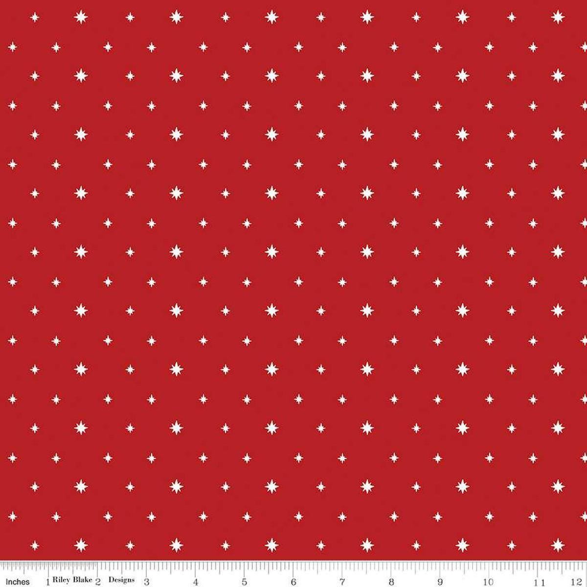 Image of the Charming Christmas Stars Red quilting cotton fabric by Riley Blake Designs. Features stars on a red background. Cute Little Fabric Shop