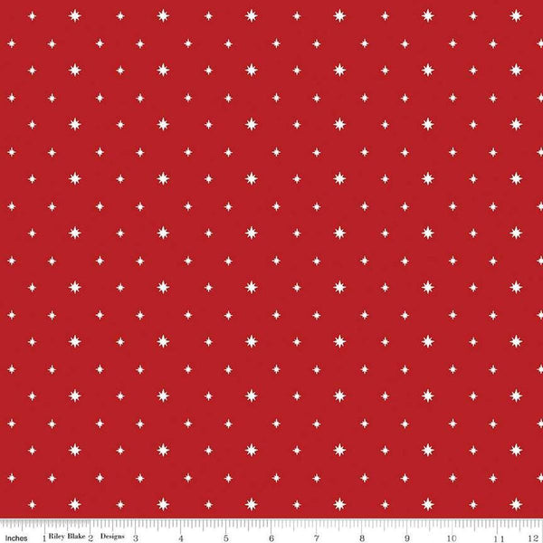 Image of the Charming Christmas Stars Red quilting cotton fabric by Riley Blake Designs. Features stars on a red background. Cute Little Fabric Shop