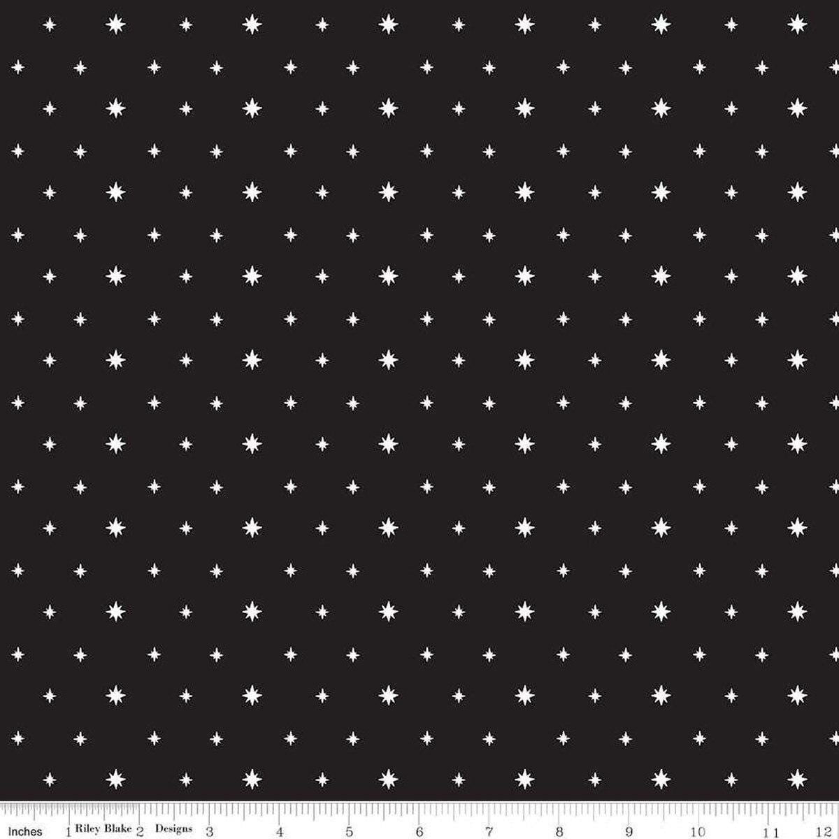 Image of the Charming Christmas Stars Black quilting cotton fabric by Riley Blake Designs. Features stars on a black background. Cute Little Fabric Shop