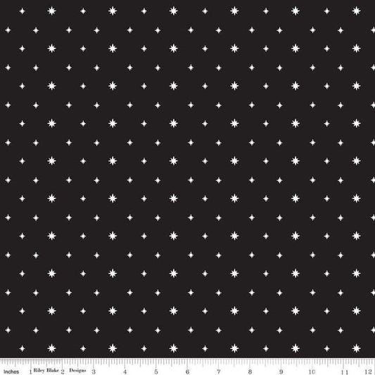Image of the Charming Christmas Stars Black quilting cotton fabric by Riley Blake Designs. Features stars on a black background. Cute Little Fabric Shop