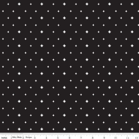 Image of the Charming Christmas Stars Black quilting cotton fabric by Riley Blake Designs. Features stars on a black background. Cute Little Fabric Shop