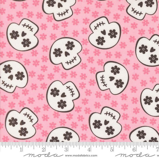Image of the Fab Boo Lous Skull Pink Candy quilting cotton fabric. Features skulls on a pink background. Cute Little Fabric Shop