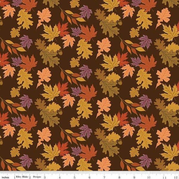 Image of the Awe of Autumn Leaves Brown quilting cotton fabric by Riley Blake Designs. Features leaves on a brown background. Cute Little Fabric Shop