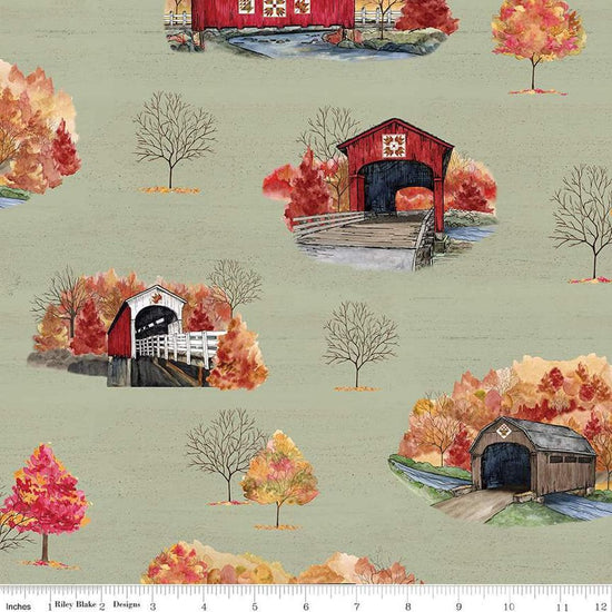 Image of the Covered Bridges in Fall Main Sage quilting cotton fabric by Riley Blake Designs. Features bridges on a green background. Cute Little Fabric Shop