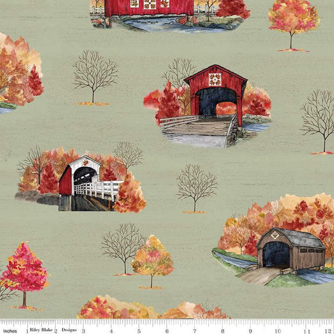 Image of the Covered Bridges in Fall Main Sage quilting cotton fabric by Riley Blake Designs. Features bridges on a green background. Cute Little Fabric Shop
