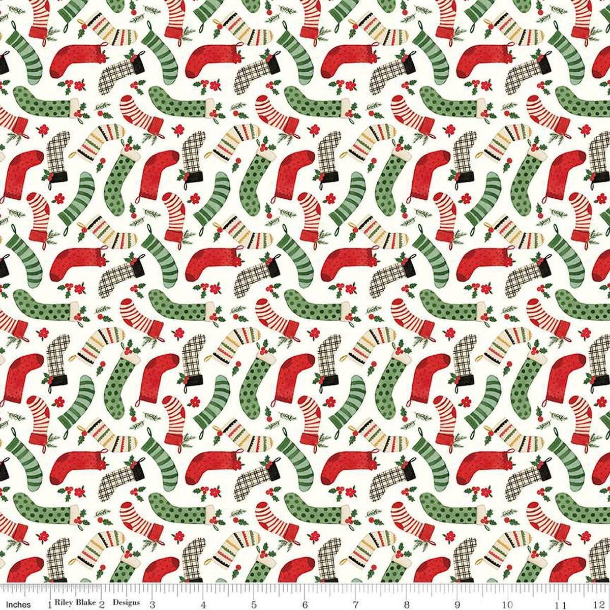 Image of the Charming Christmas Stockings Cloud quilting cotton fabric by Riley Blake Designs. Features holidays on a cream background. Cute Little Fabric Shop