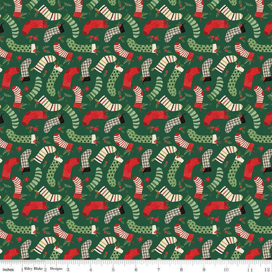 Image of the Charming Christmas Stockings Green quilting cotton fabric by Riley Blake Designs. Features holidays on a green background. Cute Little Fabric Shop