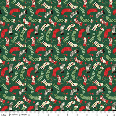 Image of the Charming Christmas Stockings Green quilting cotton fabric by Riley Blake Designs. Features holidays on a green background. Cute Little Fabric Shop