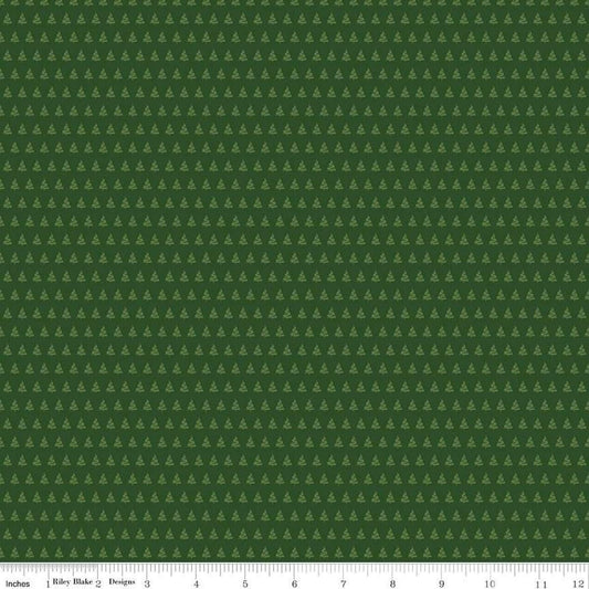 Image of the More Christmas Wishes Trees Forest quilting cotton fabric by Riley Blake Designs. Features trees on a green background. Cute Little Fabric Shop