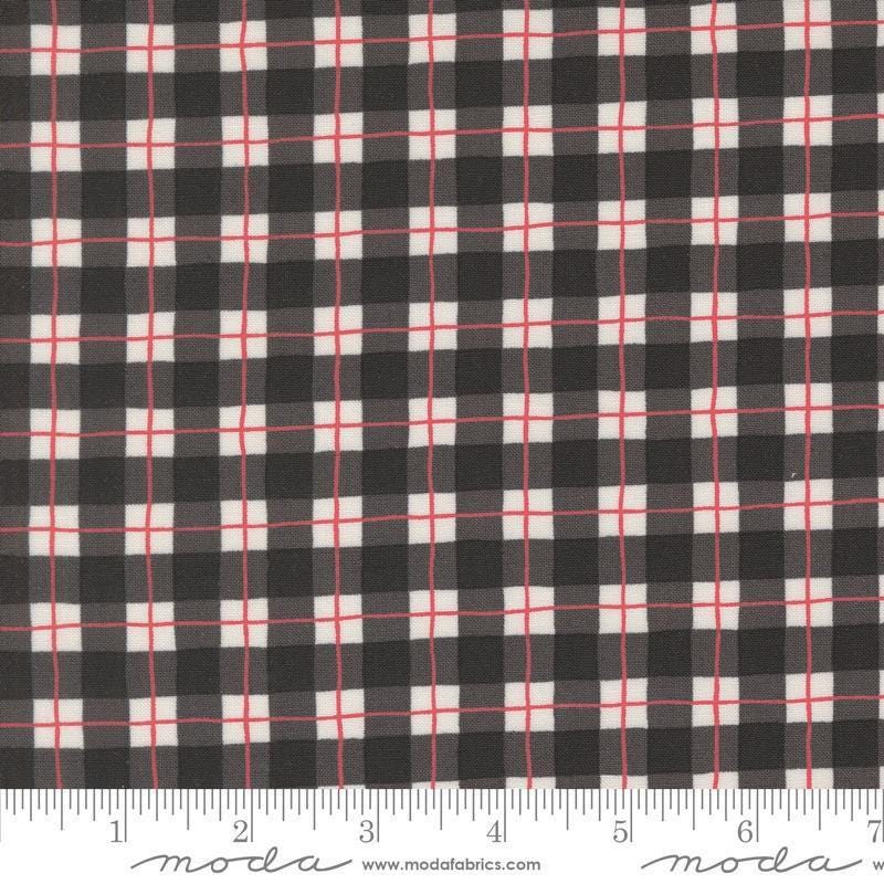 Image of the Winter Friends Plaid Charcoal Black quilting cotton fabric by Moda Fabrics. Features checks on a black background. Cute Little Fabric Shop
