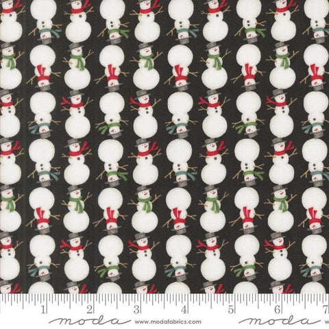 Image of the Winter Friends Snowmen Charcoal Black quilting cotton fabric by Moda Fabrics. Features snow men on a black background. Cute Little Fabric Shop