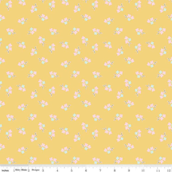 Image of the Summer Skies and Fireflies Floral Yellow Quilting Cotton Fabric by Riley Blake Designs. Features flowers on a yellow background. Cute Little Fabric Shop