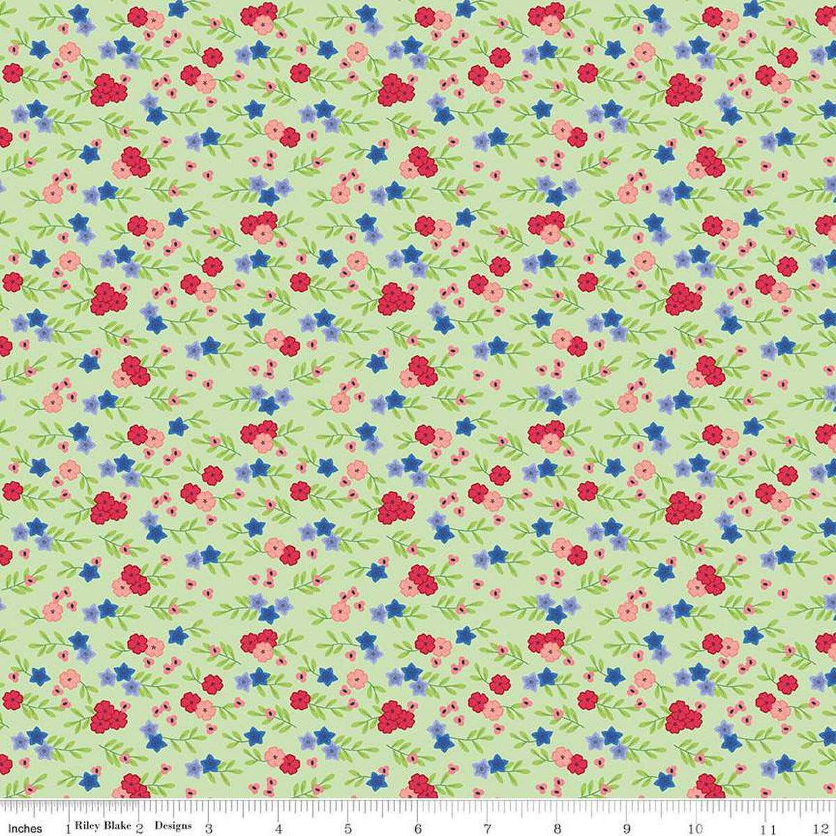 Image of the Cloudburst Floral Green quilting cotton fabric by Riley Blake Designs. Features flowers on a green background. Cute Little Fabric Shop