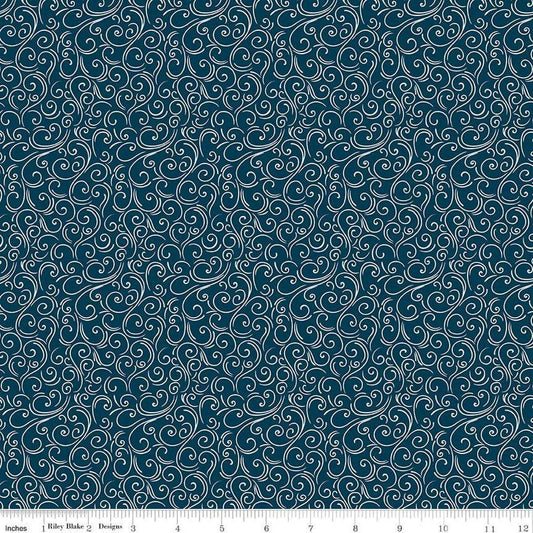 Image of the Winter Magic Swirls Navy quilting cotton fabric by Riley Blake Designs. Features swirls on a blue background. Cute Little Fabric Shop