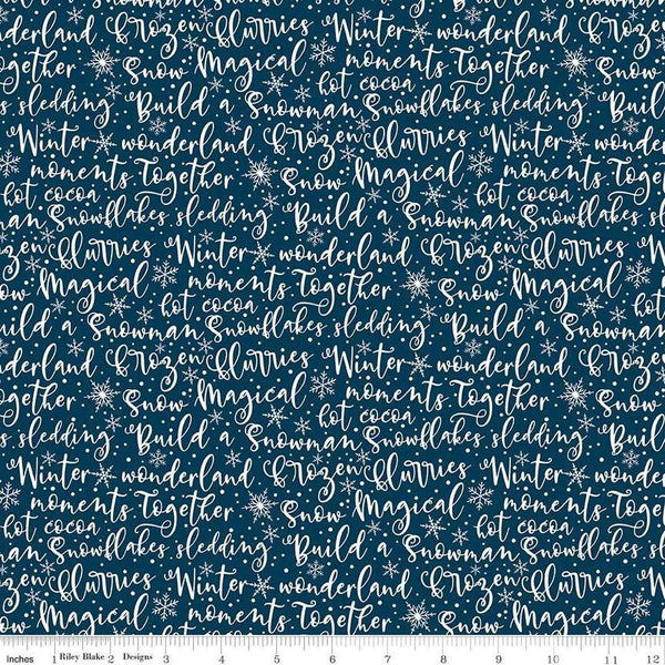 Image of the Winter Magic Winter Words Navy quilting cotton fabric by Riley Blake Designs. Features words on a blue background. Cute Little Fabric Shop