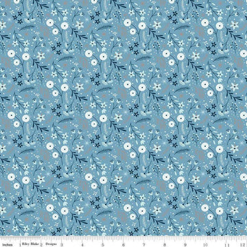 Image of the Winter Magic Floral Blue quilting cotton fabric by Riley Blake Designs. Features flowers on a blue background. Cute Little Fabric Shop