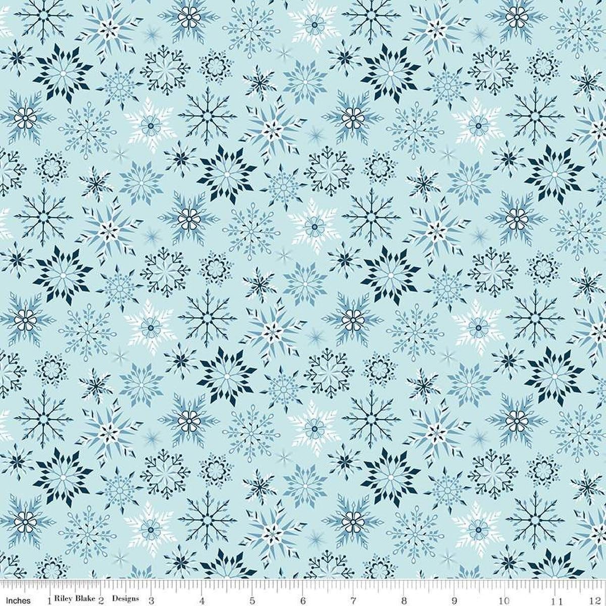 Image of the Winter Magic Snowflakes Aqua quilting cotton fabric by Riley Blake Designs. Features snowflakes on a blue background. Cute Little Fabric Shop