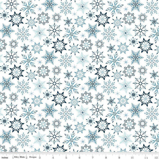 Image of the Winter Magic Snowflakes White quilting cotton fabric by Riley Blake Designs. Features snowflakes on a white background. Cute Little Fabric Shop