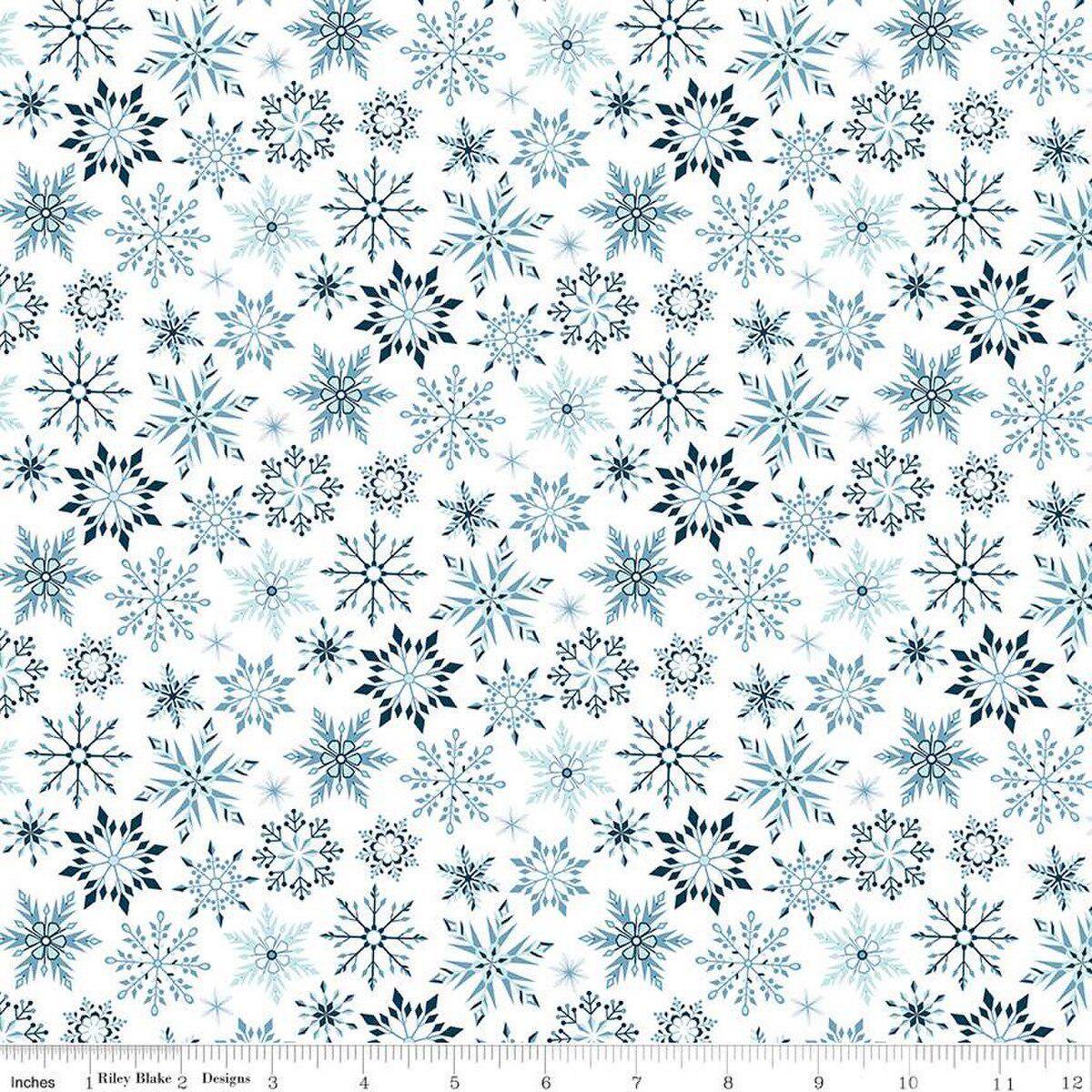 Image of the Winter Magic Snowflakes White quilting cotton fabric by Riley Blake Designs. Features snowflakes on a white background. Cute Little Fabric Shop