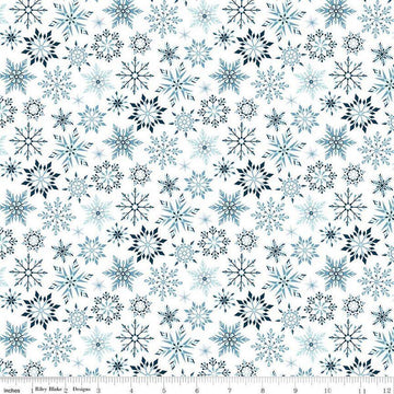 Image of the Winter Magic Snowflakes White quilting cotton fabric by Riley Blake Designs. Features snowflakes on a white background. Cute Little Fabric Shop
