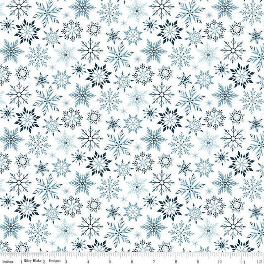Image of the Winter Magic Snowflakes White quilting cotton fabric by Riley Blake Designs. Features snowflakes on a white background. Cute Little Fabric Shop