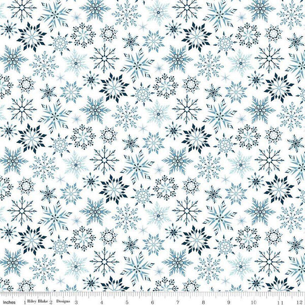Image of the Winter Magic Snowflakes White quilting cotton fabric by Riley Blake Designs. Features snowflakes on a white background. Cute Little Fabric Shop