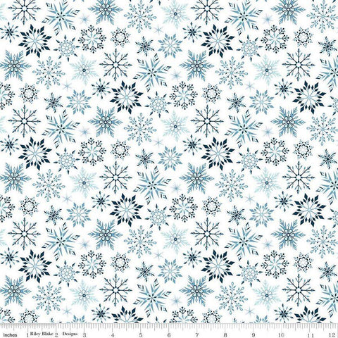Image of the Winter Magic Snowflakes White quilting cotton fabric by Riley Blake Designs. Features snowflakes on a white background. Cute Little Fabric Shop