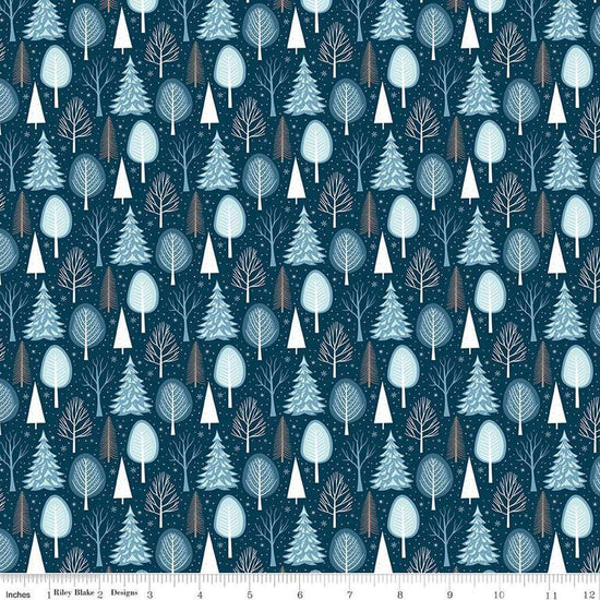 Image of the Winter Magic Trees Blue quilting cotton fabric by Riley Blake Designs. Features trees on a blue background. Cute Little Fabric Shop