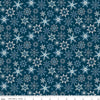Image of the Winter Magic Snowflakes Navy quilting cotton fabric by Riley Blake Designs. Features snowflakes on a blue background. Cute Little Fabric Shop