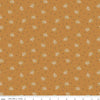 Image of the Gentler Times Lovely Butterscotch quilting cotton fabric by Riley Blake Designs. Features flowers on a tan background. Cute Little Fabric Shop