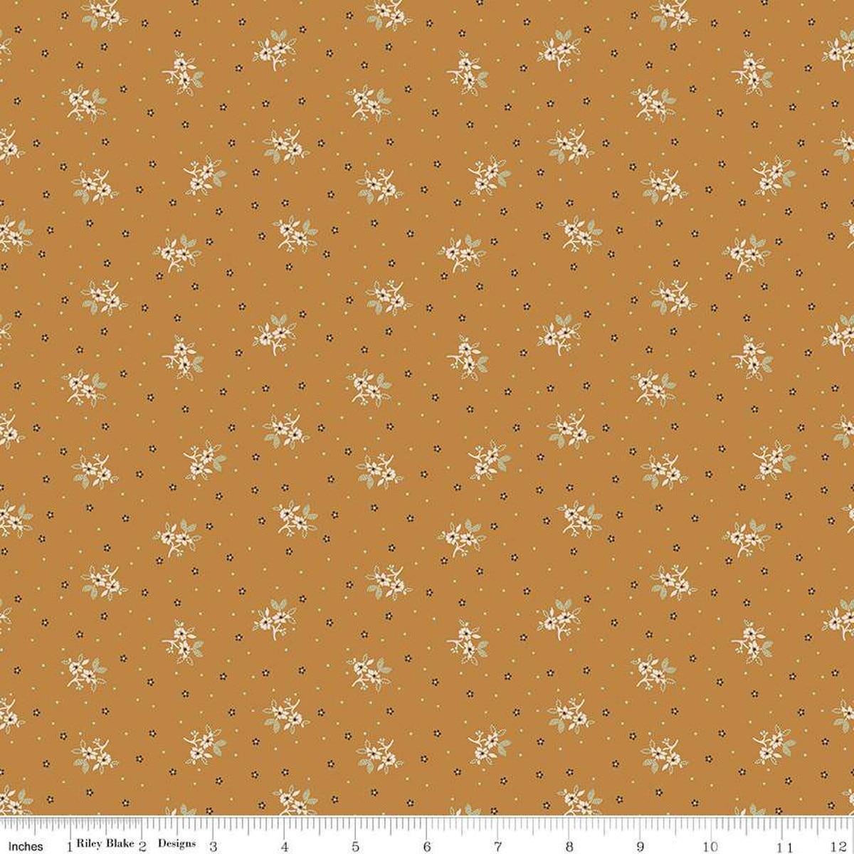 Image of the Gentler Times Lovely Butterscotch quilting cotton fabric by Riley Blake Designs. Features flowers on a tan background. Cute Little Fabric Shop