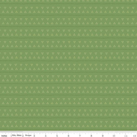 Image of the Gentler Times Remember Basil quilting cotton fabric by Riley Blake Designs. Features dots on a green background. Cute Little Fabric Shop