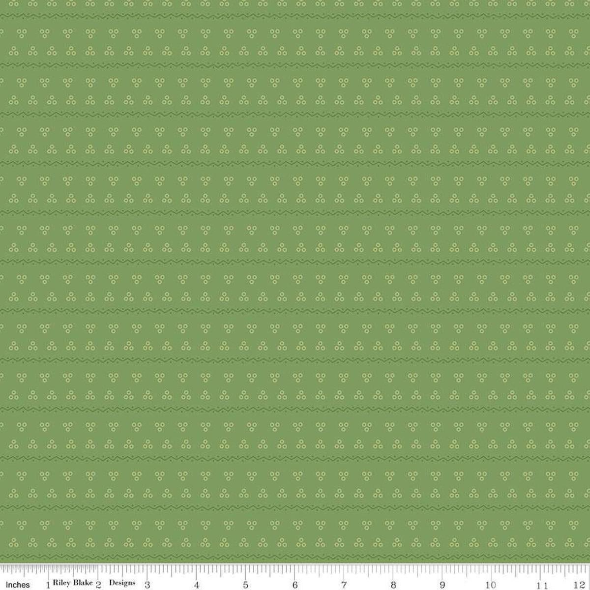 Image of the Gentler Times Remember Basil quilting cotton fabric by Riley Blake Designs. Features dots on a green background. Cute Little Fabric Shop