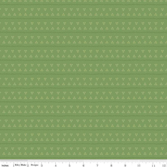 Image of the Gentler Times Remember Basil quilting cotton fabric by Riley Blake Designs. Features dots on a green background. Cute Little Fabric Shop