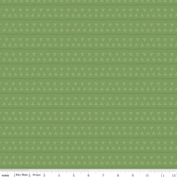 Image of the Gentler Times Remember Basil quilting cotton fabric by Riley Blake Designs. Features dots on a green background. Cute Little Fabric Shop
