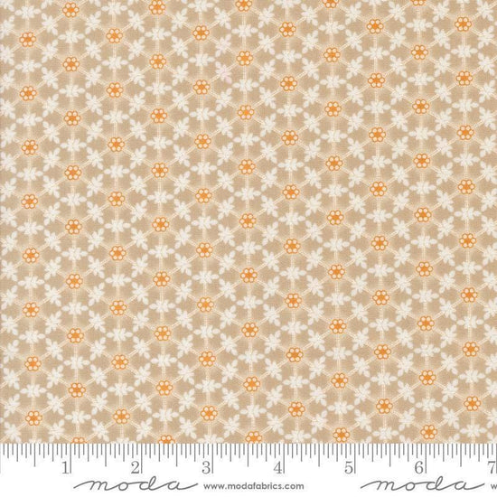 Image of the Agatha Road Wreaths Smoke quilting cotton fabric by Moda Fabrics. Features flowers on a brown background. Cute Little Fabric Shop